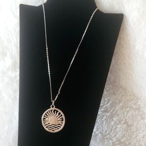 Elegant Silver Sun Pendant Necklace